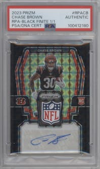 Chase Brown from the 2023 Panini Prizm set featuring a Black Finite parallel graded by PSA and given an overall grade of 0.