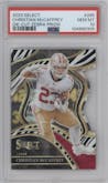 Christian McCaffrey from the 2023 Panini Select set featuring a Die-Cut Zebra parallel graded by PSA and given an overall grade of 10.