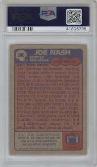 Joe Nash from the 1985 Topps set graded by PSA and given an overall grade of 8.5.