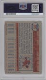 Mickey Mantle from the 1957 Topps set graded by PSA and given an overall grade of 4.