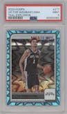 Victor Wembanyama from the 2023-24 Panini NBA Hoops set featuring a Teal Explosion parallel graded by PSA and given an overall grade of 9.