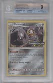 Melmetal from the 2019 Pokemon S&M  set featuring a Unbroken Bonds Staff parallel graded by Beckett and given an overall grade of 9.