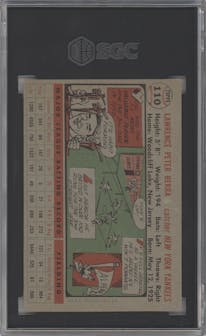 Yogi Berra from the 1956 Topps set featuring a Gray Back parallel graded by SGC and given an overall grade of 3.5.