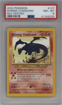 Shining Charizard from the 2002 Pokemon Neo Genesis set graded by PSA and given an overall grade of 8.