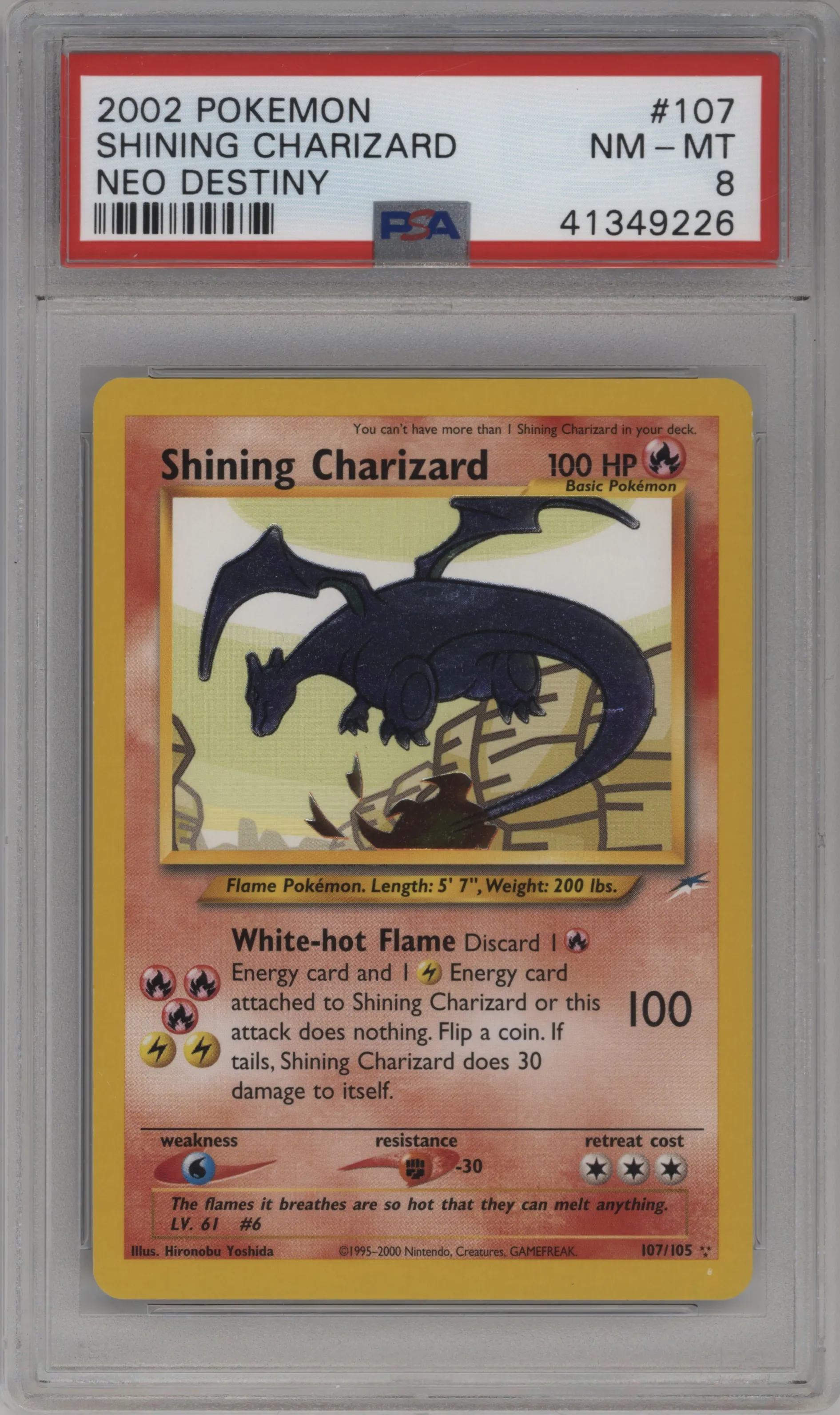 Shining Charizard from the 2002 Pokemon Neo Genesis set graded by PSA and given an overall grade of 8.