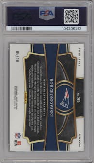 Rob Gronkowski from the 2023 Panini Select set featuring a Gold Dragon Scale parallel graded by PSA and given an overall grade of 10.