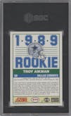 Troy Aikman from the 1989 Score set graded by SGC and given an overall grade of 9.5.
