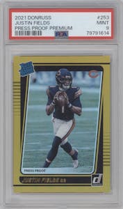 Justin Fields from the 2021 Panini Donruss set featuring a Press Proof Premium parallel graded by PSA and given an overall grade of 9.