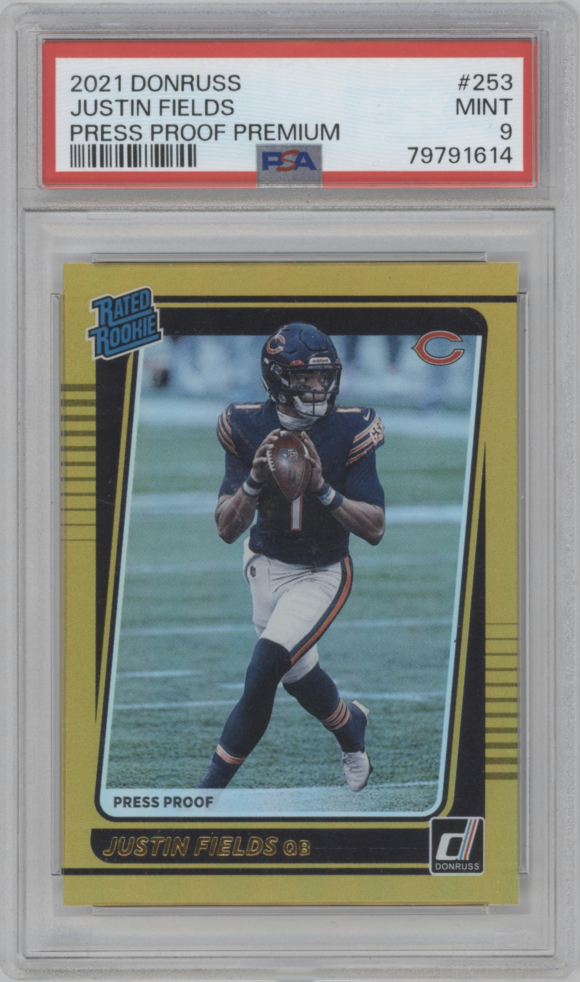 Justin Fields from the 2021 Panini Donruss set featuring a Press Proof Premium parallel graded by PSA and given an overall grade of 9.