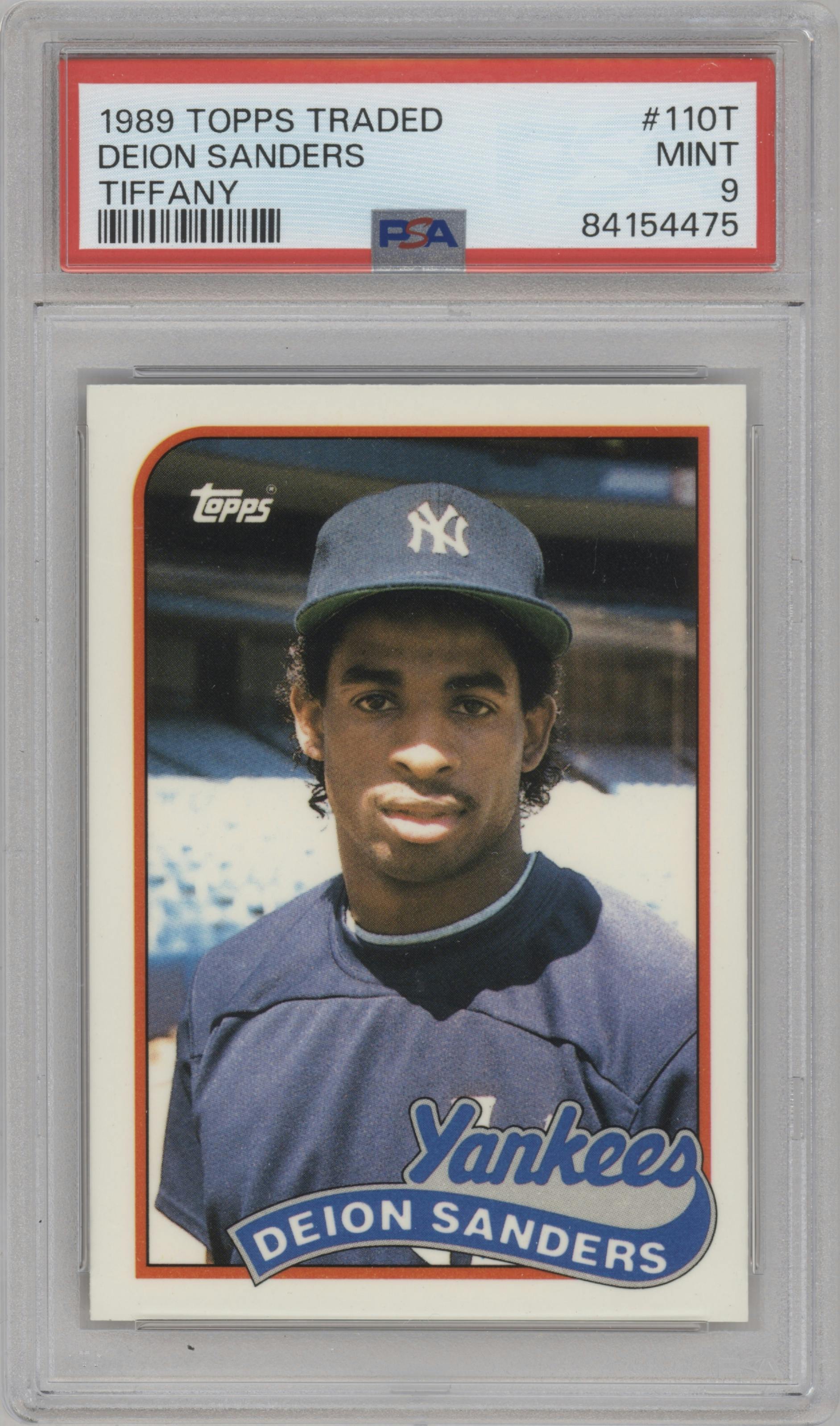 Deion Sanders from the 1989 Topps Traded set featuring a Tiffany parallel graded by PSA and given an overall grade of 9.