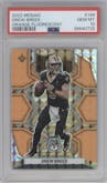 Drew Brees from the 2022 Panini Mosaic set featuring a Orange Fluorescent parallel graded by PSA and given an overall grade of 10.