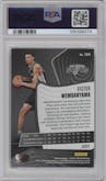 Victor Wembanyama from the 2023-24 Panini Revolution set featuring a Groove parallel graded by PSA and given an overall grade of 9.