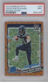 Jaxon Smith-Njigba from the 2023 Donruss Optic set featuring a Orange Scope parallel graded by PSA and given an overall grade of 9.