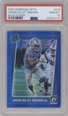 Amon-Ra St. Brown from the 2021 Panini Donruss Optic set featuring a Blue Hyper parallel graded by PSA and given an overall grade of 10.
