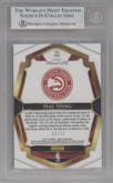 Trae Young from the 2018-19 Panini Select  set featuring a Die-Cut Prizm Neon Orange Pulsar FOTL parallel graded by Beckett and given an overall grade of 9.