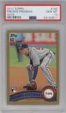 Freddie Freeman from the 2011 Topps set featuring a Gold parallel graded by PSA and given an overall grade of 10.