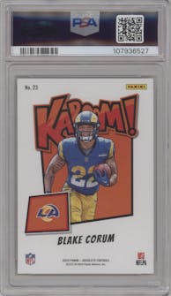 Blake Corum from the 2024 Panini Absolute set featuring a Gold parallel graded by PSA and given an overall grade of 9.