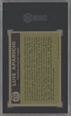 Luis Aparicio from the 1961 Topps set graded by SGC and given an overall grade of 6.