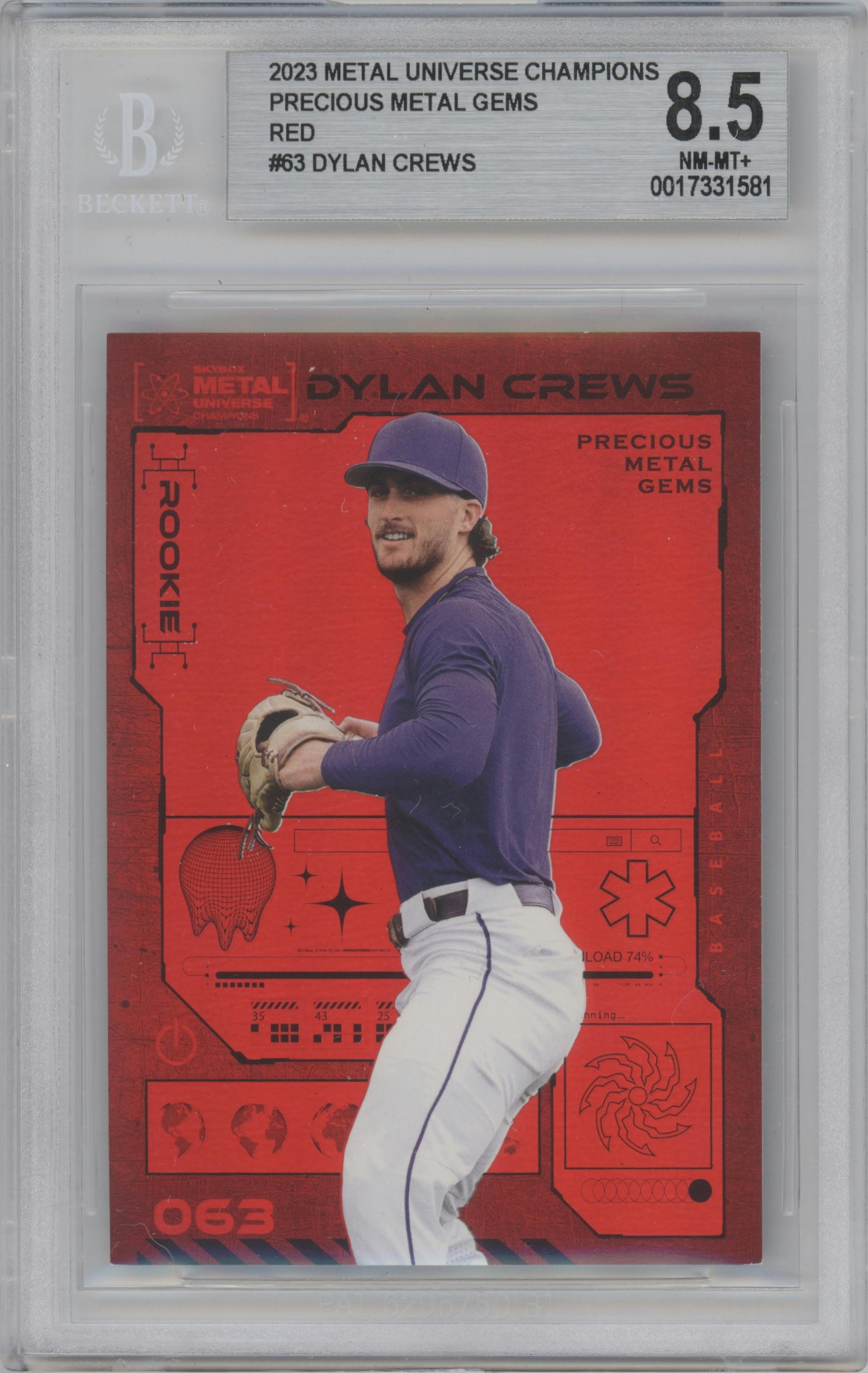 Dylan Crews from the 2023 Skybox Metal Universe Champions set featuring a Red Precious Metal Gems parallel graded by Beckett and given an overall grade of 8.5.