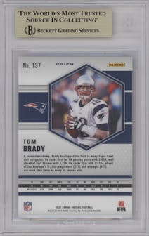 Tom Brady from the 2021 Panini Mosaic set featuring a Reactive Orange parallel graded by Beckett and given an overall grade of 9.5.