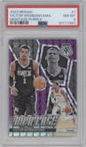 Victor Wembanyama from the 2023-24 Panini Mosaic set featuring a Purple parallel graded by PSA and given an overall grade of 8.