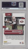 Brock Purdy from the 2022 Panini Donruss set graded by PSA and given an overall grade of 9.