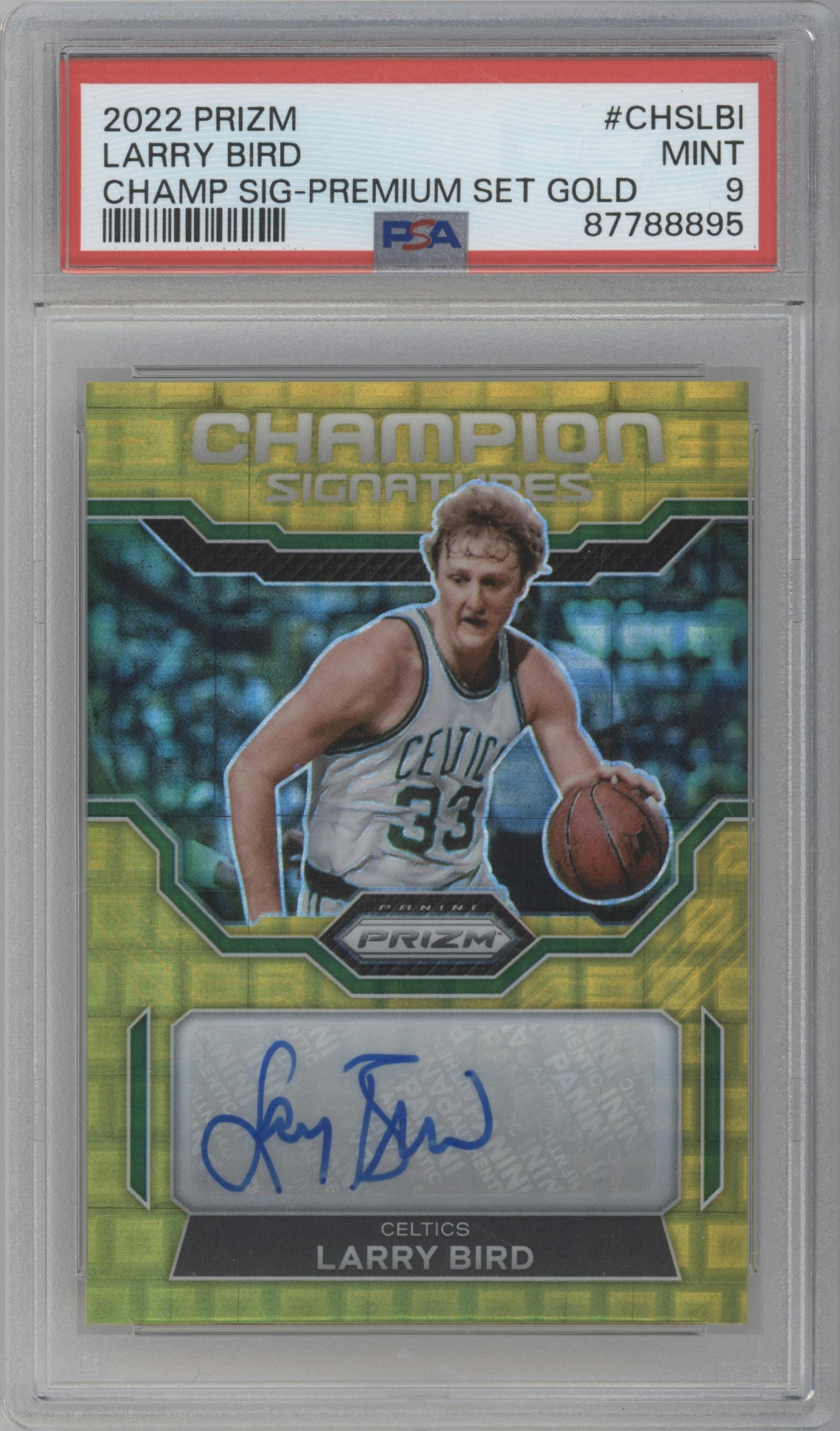 Larry Bird from the 2022-23 Panini Prizm  set featuring a Gold Premium Factory parallel graded by PSA and given an overall grade of 9.
