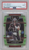 Tom Brady from the 2021 Panini Select set featuring a Die-Cut Neon Green parallel graded by PSA and given an overall grade of 9.