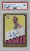 Larry Bird from the 2023-24 Topps Chrome set featuring a Gold Refractor parallel graded by PSA and given an overall grade of 9.