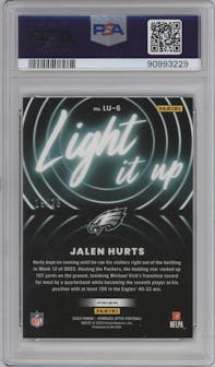 Jalen Hurts  from the 2022 Panini Donruss Optic set featuring a Pandora Black parallel graded by PSA and given an overall grade of 9.