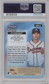 Austin Riley from the 2024 Topps Chrome set featuring a Orange Refractor parallel graded by PSA and given an overall grade of 10.