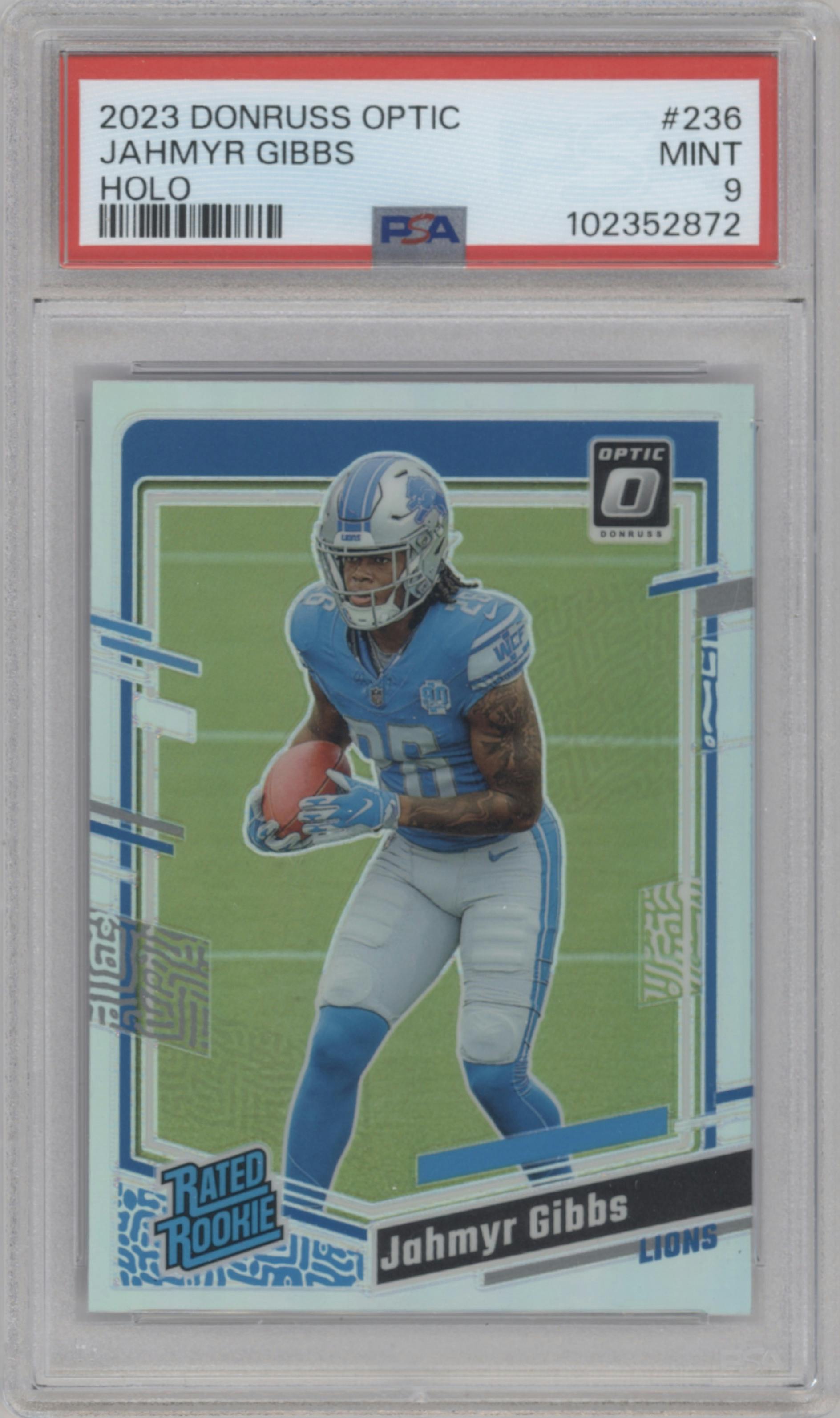 Jahmyr Gibbs from the 2023 Donruss Optic set featuring a Holo parallel graded by PSA and given an overall grade of 9.
