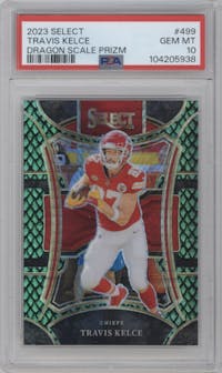 Travis Kelce from the 2023 Panini Select set featuring a Dragon Scale parallel graded by PSA and given an overall grade of 10.