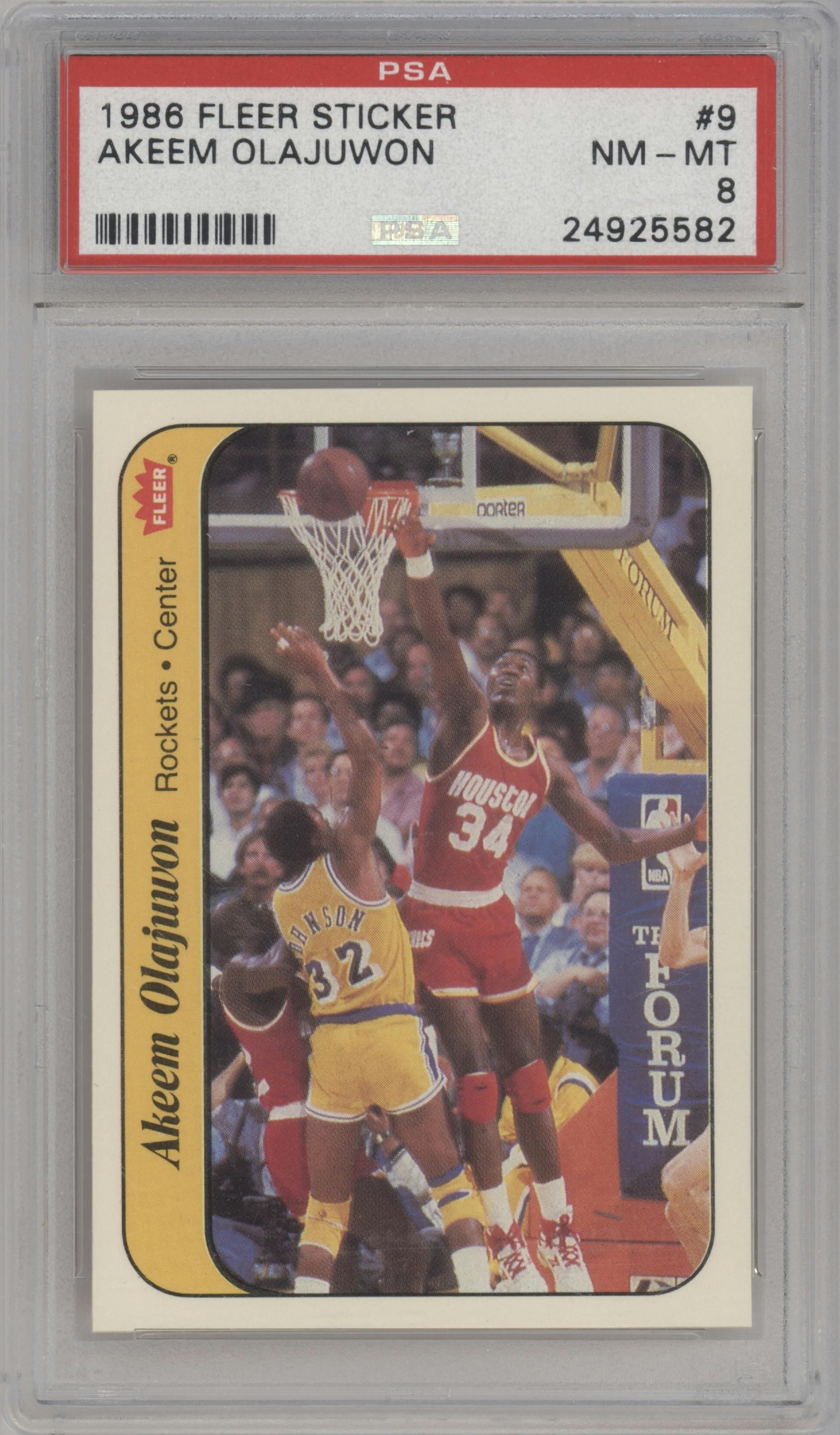 Akeem Olajuwon from the 1986-87 Fleer set graded by PSA and given an overall grade of 8.
