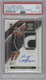 Cameron Thomas from the 2021-22 Panini Impeccable  set featuring a Holo Gold parallel graded by PSA and given an overall grade of 9.