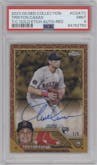 Triston Casas from the 2023 Topps Gilded Collection set featuring a Red parallel graded by PSA and given an overall grade of 9.