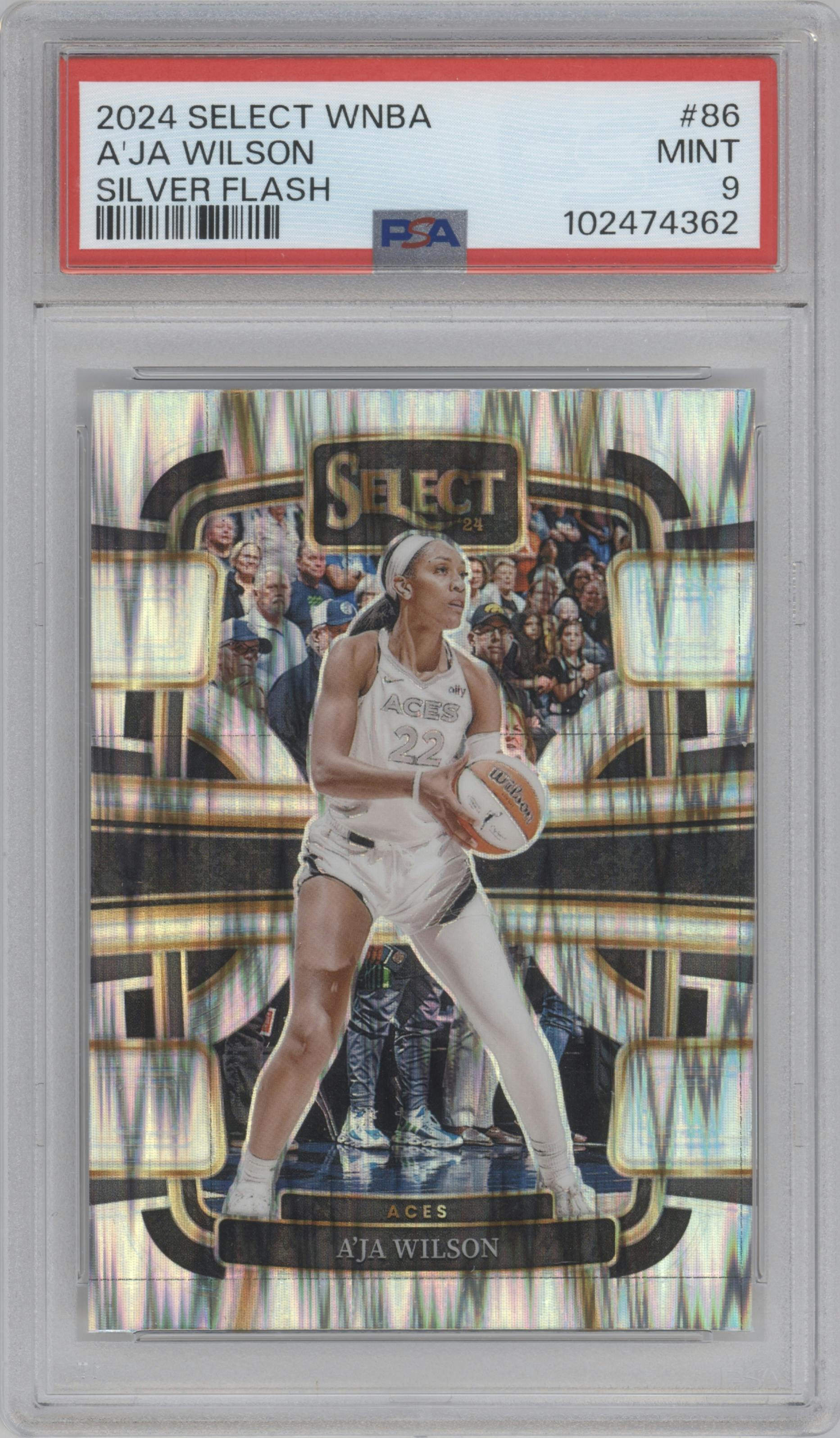 A’ja Wilson from the 2024 Panini Select WNBA set featuring a Silver Flash Prizm  parallel graded by PSA and given an overall grade of 9.