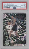 Victor Wembanyama from the 2023-24 Panini Revolution set featuring a Chinese New Year Emerald parallel graded by PSA and given an overall grade of 10.