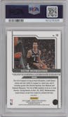 Victor Wembanyama from the 2023-24 Donruss Optic set featuring a Holo parallel graded by PSA and given an overall grade of 10.