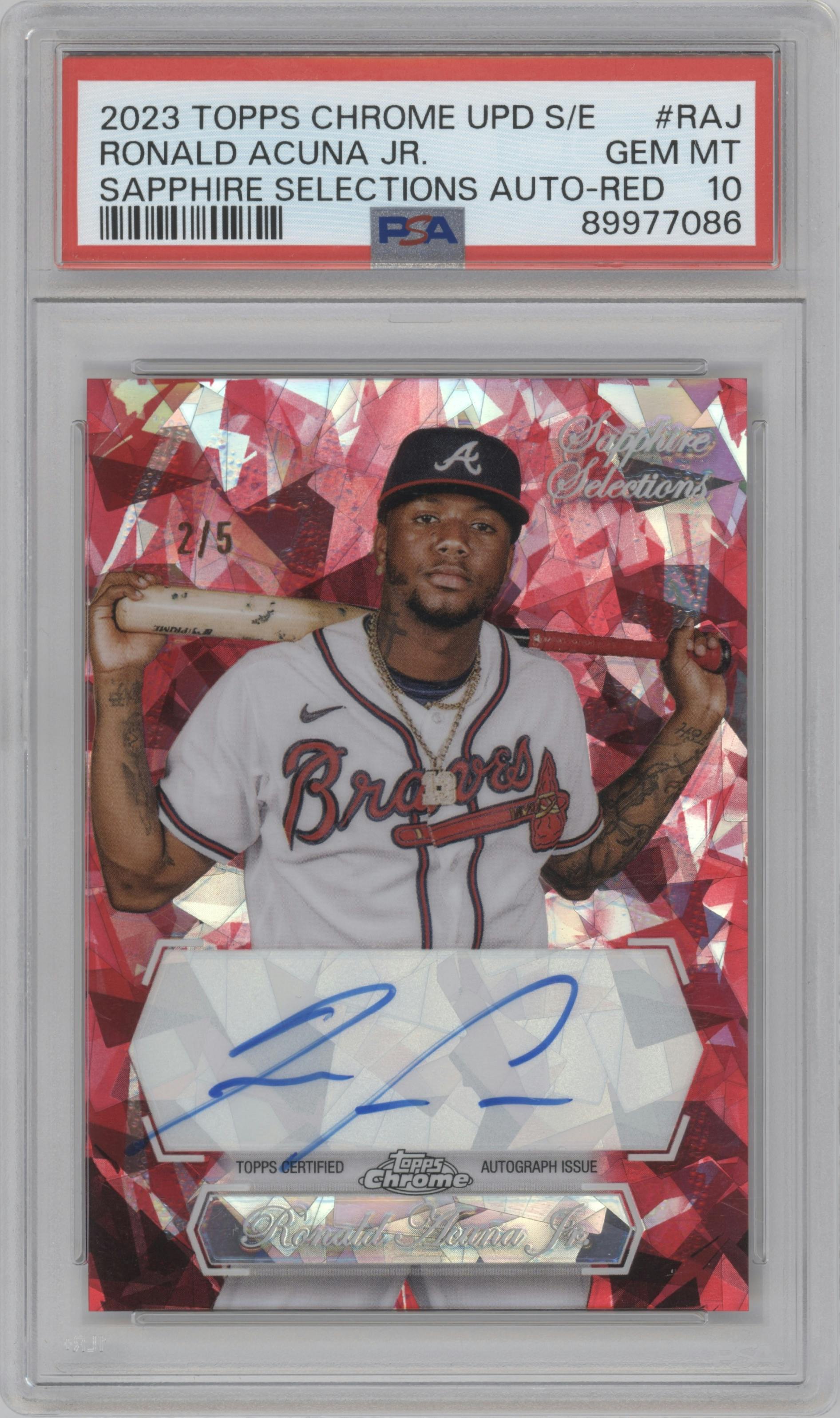 Ronald Acuna Jr. from the 2023 Topps Chrome Update Series Sapphire Edition set featuring a Red parallel graded by PSA and given an overall grade of 10.