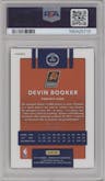Devin Booker from the 2017-18 Panini Donruss Optic set featuring a Pink parallel graded by PSA and given an overall grade of 10.