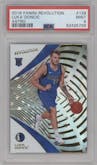 Luka Doncic from the 2018-19 Panini Revolution  set featuring a Astro parallel graded by PSA and given an overall grade of 9.