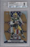 Aaron Rodgers from the 2022 Panini Mosaic set featuring a Honeycomb parallel graded by Beckett and given an overall grade of 9.