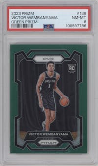 Victor Wembanyama from the 2023-24 Panini Prizm set featuring a Green Prizm parallel graded by PSA and given an overall grade of 8.