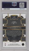 Victor Wembanyama from the 2023-24 Panini Select  set featuring a Blue Prizm parallel graded by PSA and given an overall grade of 9.