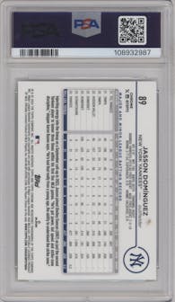 Jasson Dominguez from the 2024 Topps Chrome set featuring a Aqua Refractor parallel graded by PSA and given an overall grade of 10.