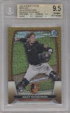 Adley Rutschman from the 2023 Bowman Mega Box set featuring a Gold Refractor parallel graded by Beckett and given an overall grade of 9.5.