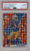 Justin Herbert from the 2020 Panini Mosaic set featuring a Reactive Orange parallel graded by PSA and given an overall grade of 10.
