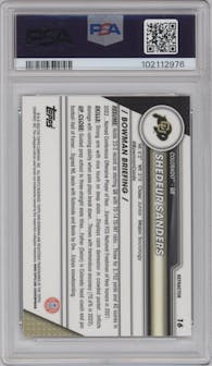 Shedeur Sanders from the 2023 Bowman Chrome University set featuring a Refractor parallel graded by PSA and given an overall grade of 8.