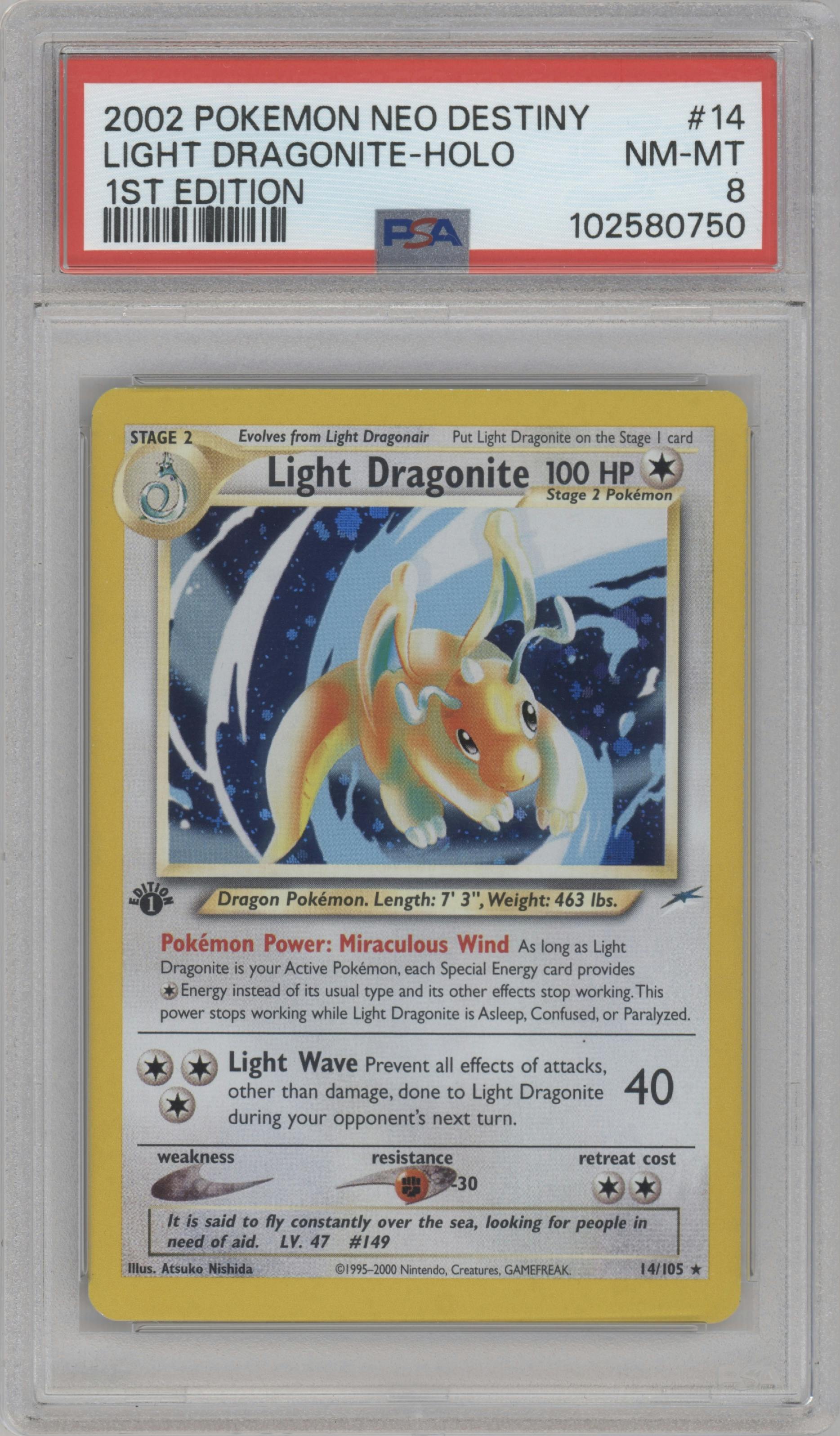 Light Dragonite from the 2002 Pokemon Neo Genesis set graded by PSA and given an overall grade of 8.
